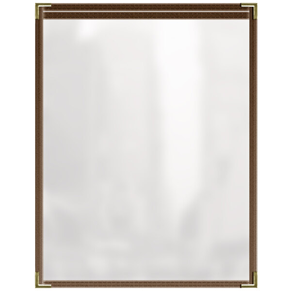 A white board with a brown frame holding two brown and gold menu pages.