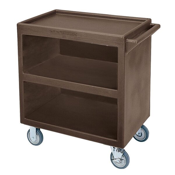 A dark brown Cambro plastic service cart with wheels and three enclosed sides.
