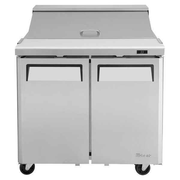 A large stainless steel Turbo Air refrigerated sandwich prep table with two doors.
