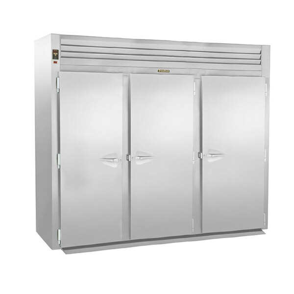 A large white Traulsen roll-in freezer with three doors.
