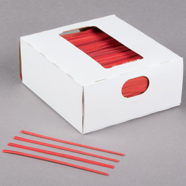 A white box of Bedford Industries Inc. red laminated twist ties with a window.