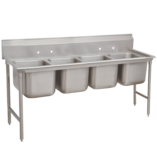 A stainless steel Advance Tabco four compartment pot sink.