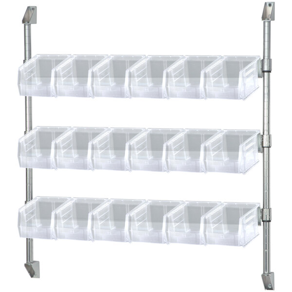 A Quantum wall mount rack with 18 clear plastic bins.