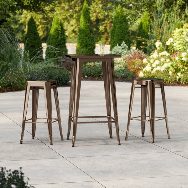 Lancaster Table & Seating Alloy Series 23 1/2" x 23 1/2" Copper Bar Height Outdoor Table with 2 Backless Barstools