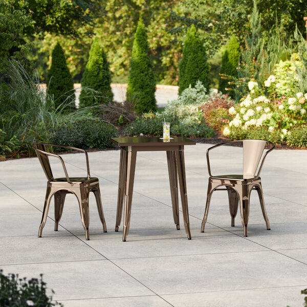 Lancaster Table & Seating Alloy Series 23 1/2" x 23 1/2" Copper Standard Height Outdoor Table with 2 Arm Chairs