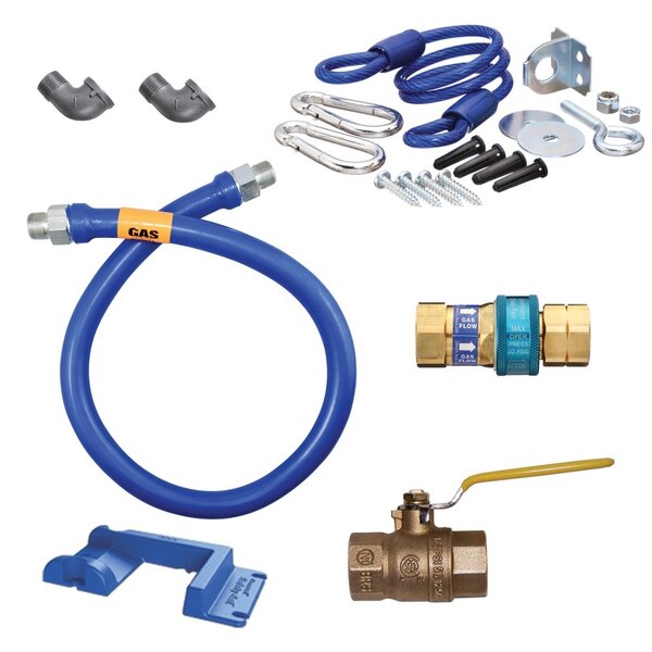 A blue flexible Dormont gas connector kit with various parts including a yellow label.