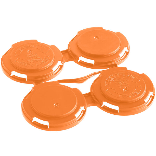 A close up of three orange plastic PakTech can carriers.