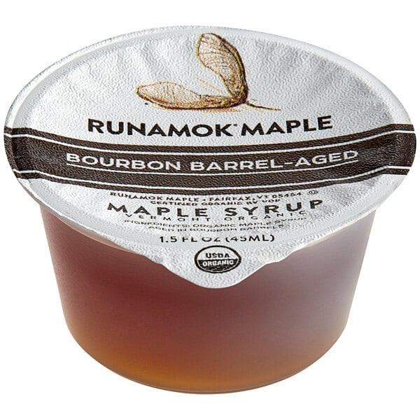 A case of Runamok Bourbon Barrel-Aged Maple Syrup single-serve cups.