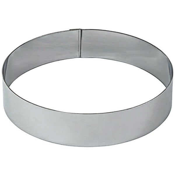 A circular stainless steel Gobel mousse ring.