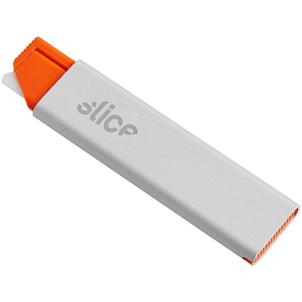 A white and orange Slice Manual Carton Cutter with a clip on it.