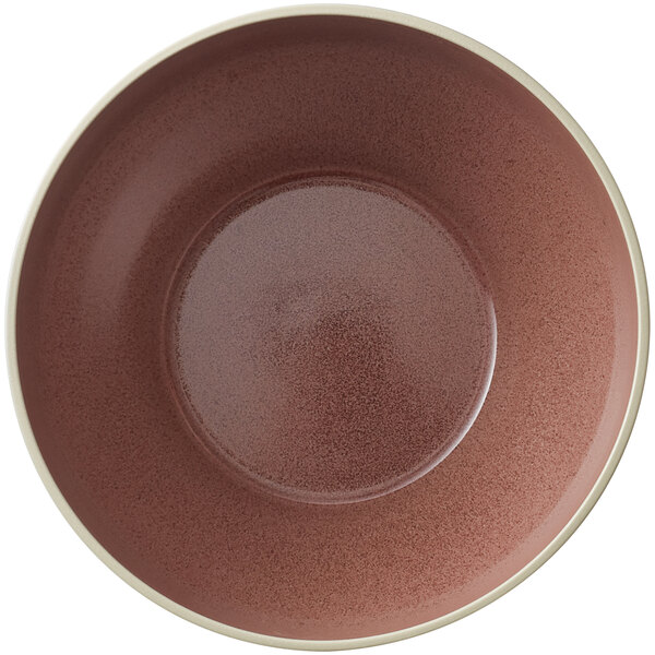 A brown and white Moira stoneware bowl.