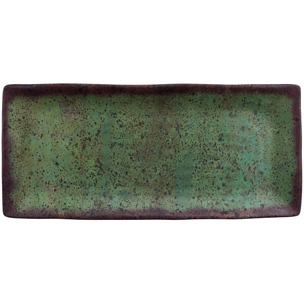 A rectangular green cheforward melamine plate with black specks.