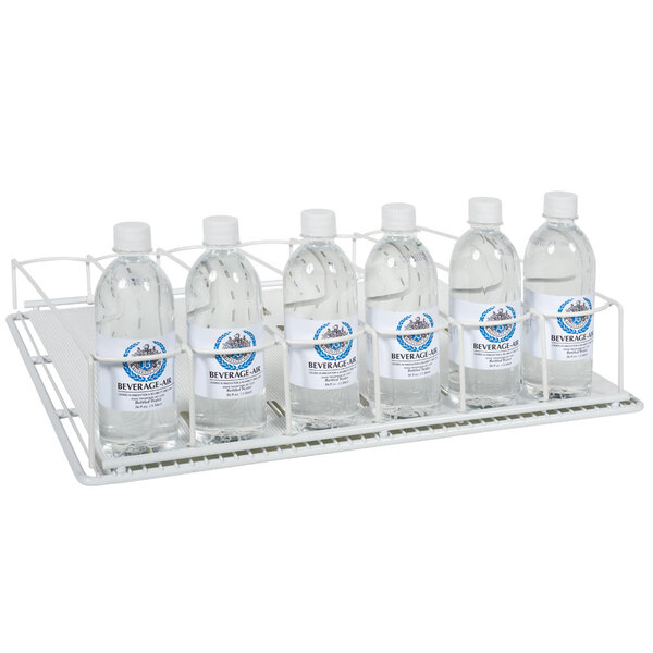 A white Gravity Flo rack with six Beverage-Air bottles of water.