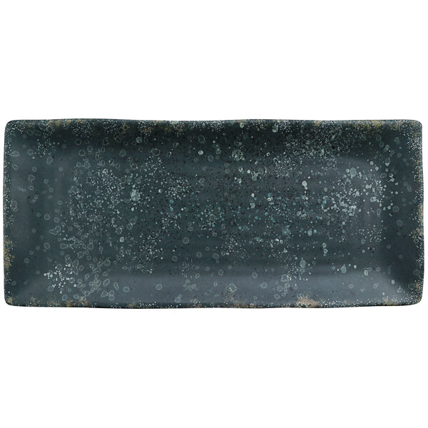 A rectangular black cheforward plate with white specks.