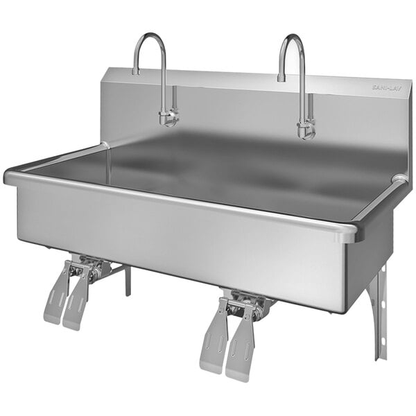 A stainless steel Sani-Lav wall mounted utility sink with 2 knee-operated faucets.