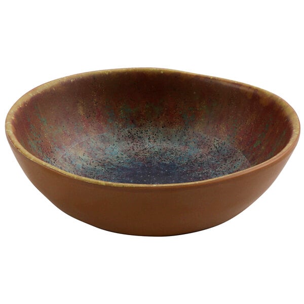 A brown bowl with a speckled surface and blue specks.