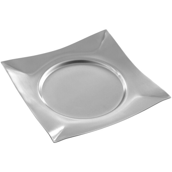 A silver stainless steel square spoon rest.
