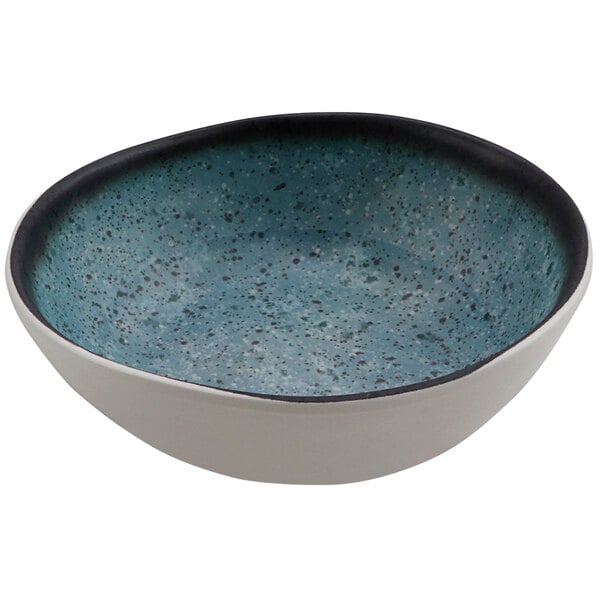 A Cheforward melamine bowl with a speckled blue surface.