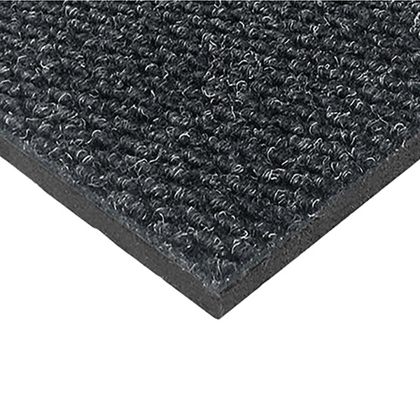 A close-up of a black Pinnacle Berber carpet mat.