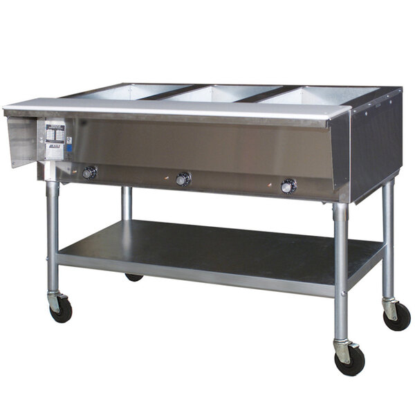 An Eagle Group stainless steel portable hot food table with three open wells on a counter.