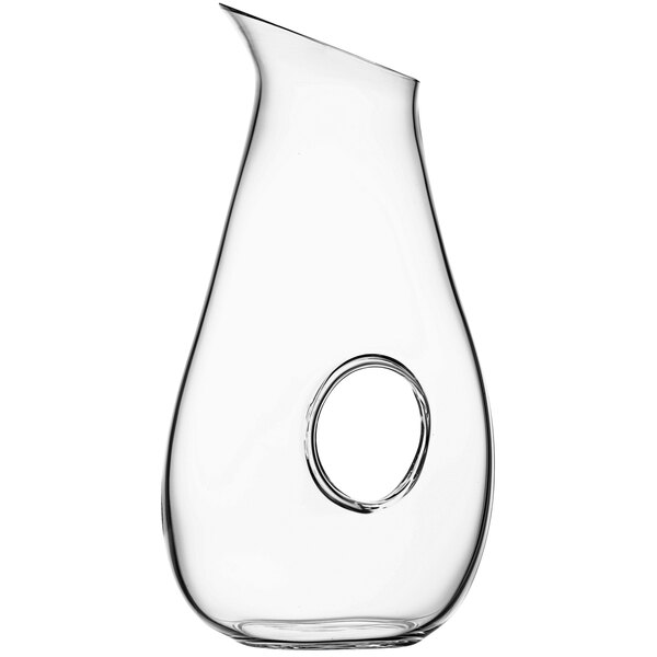 A Nude glass carafe with a circular hole in it.