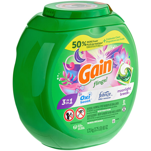 A green container of Gain Moonlight Breeze Flings laundry detergent with a label.
