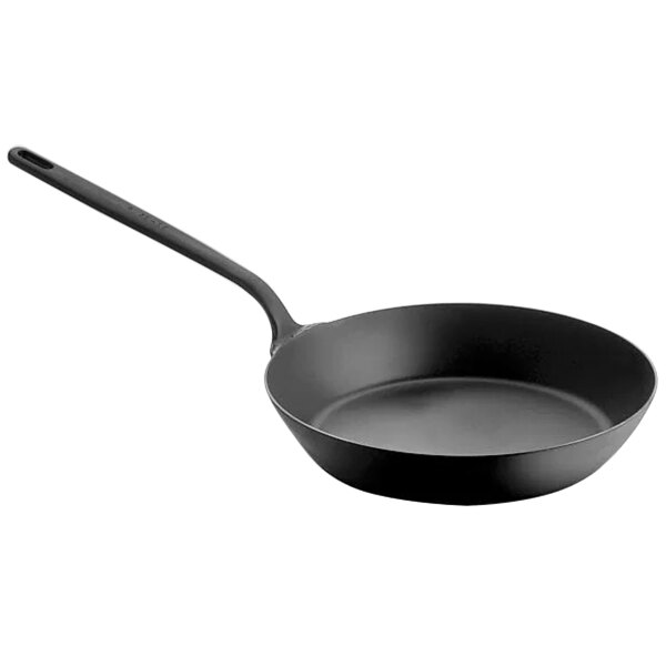 A Spring USA Black carbon steel fry pan with a handle.