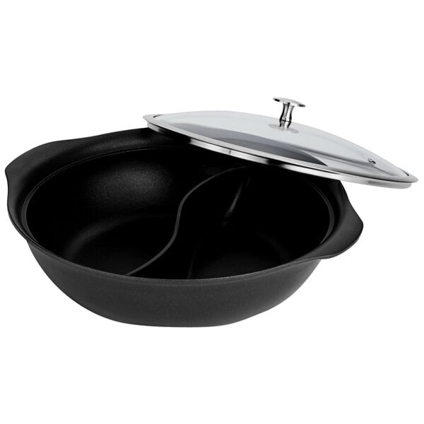 A black Spring USA divided round casserole pan with a silver lid.
