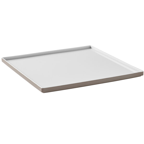 An American Metalcraft Unity white square plate with a white border.