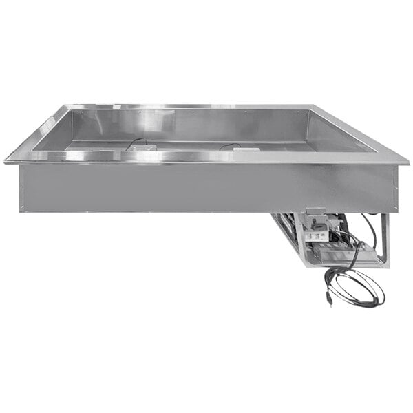 A stainless steel rectangular LTI TempestAir drop-in well with wires.