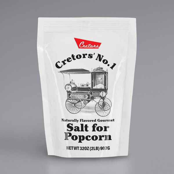 A white bag of Cretors Butter-Flavored Popcorn Salt with a picture of a train on it.