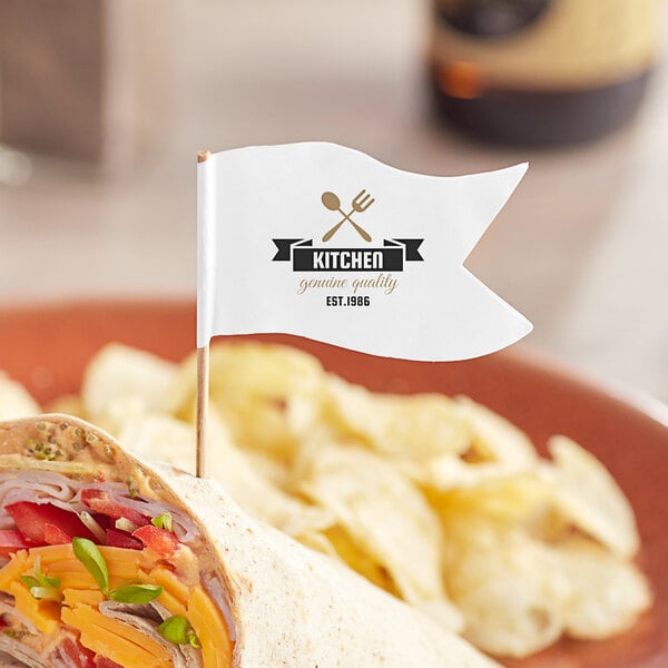 A customizable large wavy flag pick in a small flag on a plate of food.
