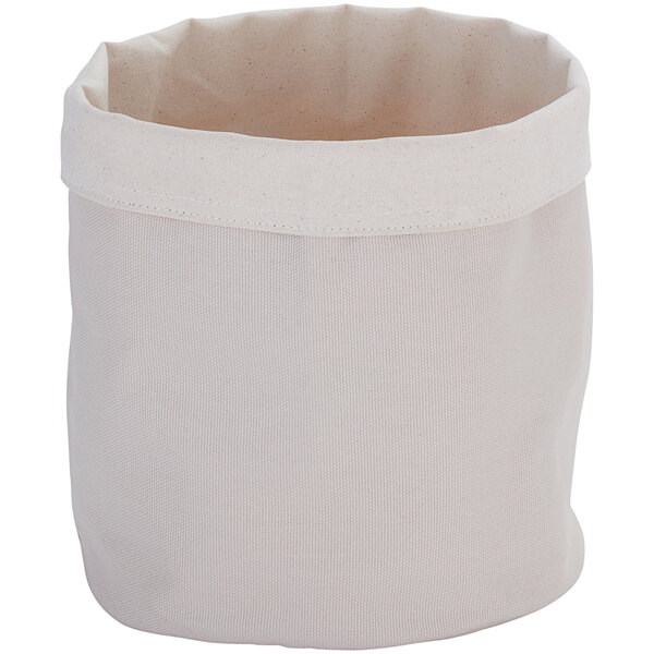 An American Metalcraft cream and gray canvas bread basket with a white fabric bag.
