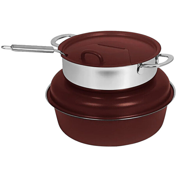 A Spring USA stainless steel soup marmite with chrome accents in red and silver.