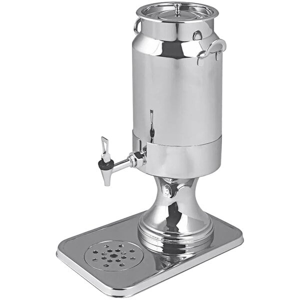 A Spring USA stainless steel milk dispenser with a metal stand and spigot.