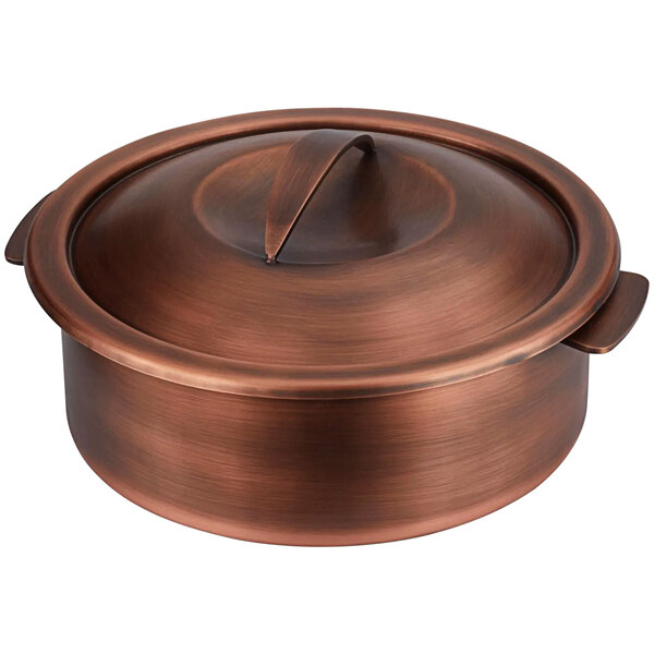 A Spring USA copper chafing dish with a stainless steel insert.