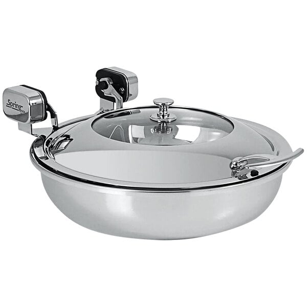 A Spring USA stainless steel sauteuse pan with a glass lid and chrome accents.