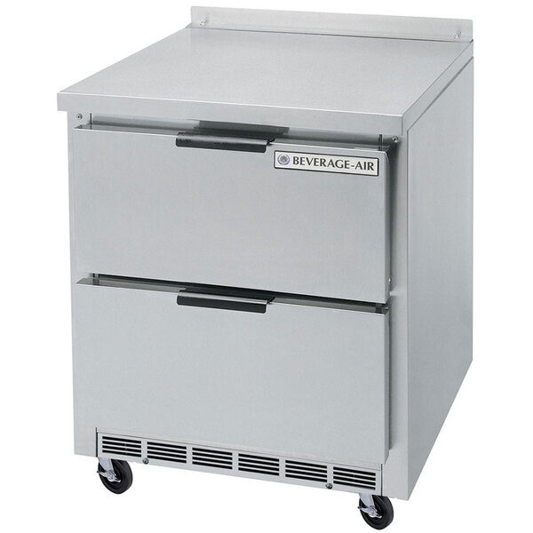 A stainless steel Beverage-Air worktop freezer with two drawers on wheels.