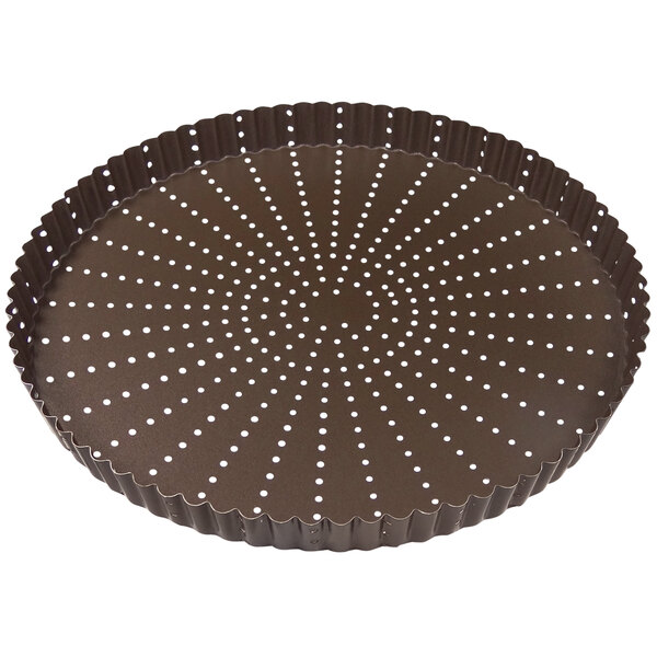 A brown round metal tray with white dots and fluted edges.