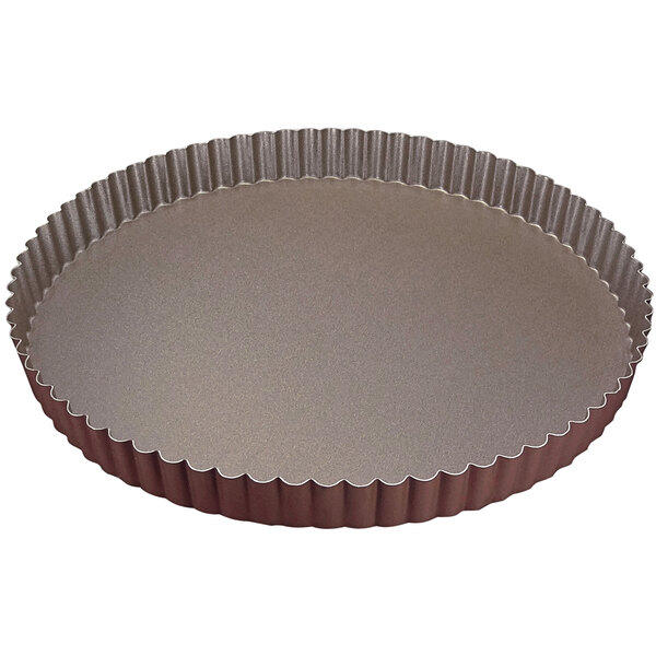 A round metal Gobel tart pan with a fluted edge.