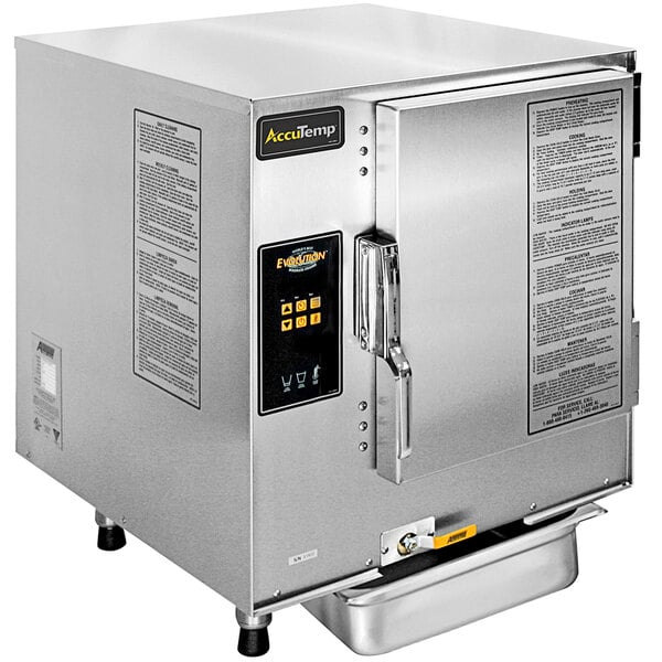 A white AccuTemp Evolution commercial electric steamer with a digital display.
