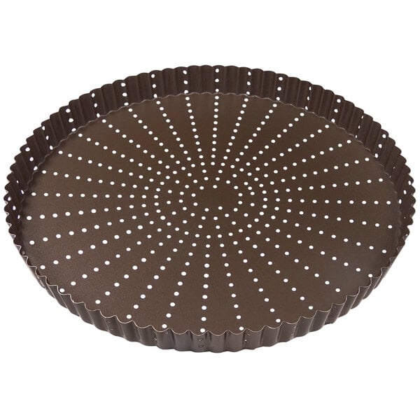 A brown round metal tray with white dots.