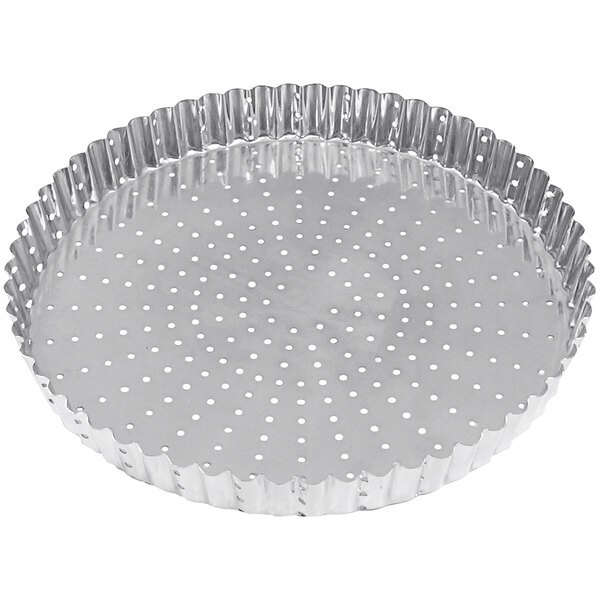 A silver round metal Gobel tart pan with holes.