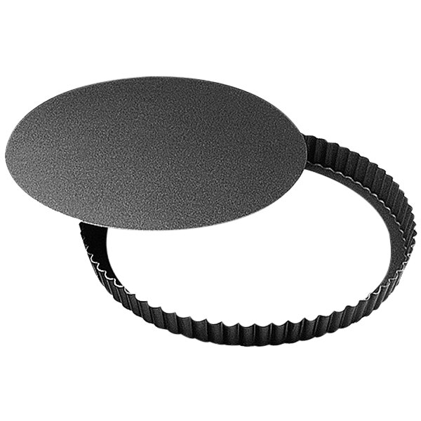A black round Gobel tart pan with a removable bottom.