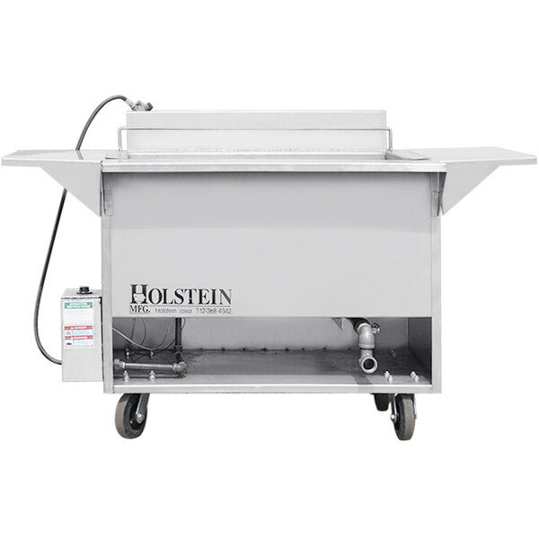 A stainless steel Holstein Manufacturing deep fat fryer on a large metal cart with wheels.