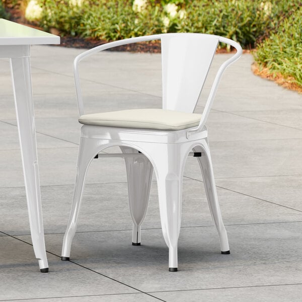 Lancaster Table & Seating Alloy Series White Outdoor Arm Chair with Tan Fabric Magnetic Cushion