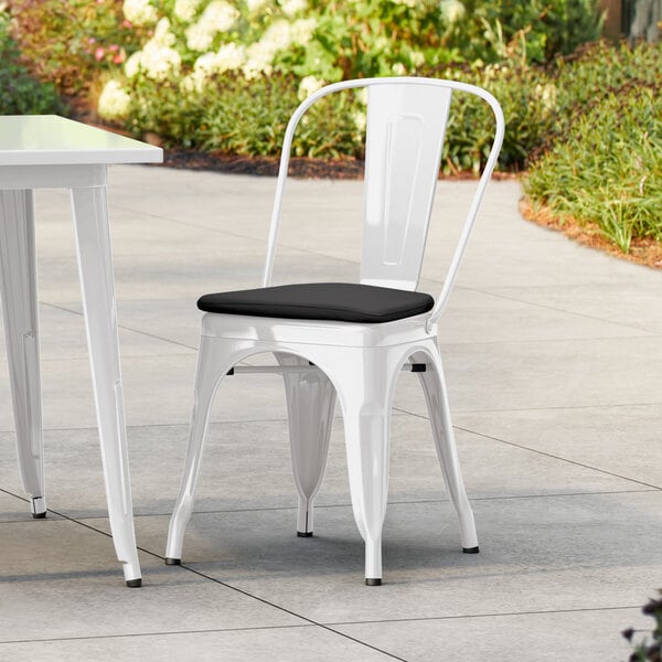 Lancaster Table & Seating Alloy Series White Outdoor Cafe Chair with Black Fabric Magnetic Cushion