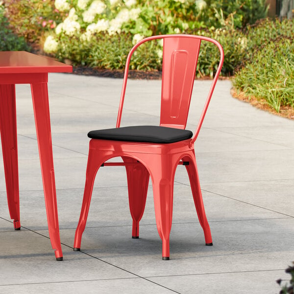 Lancaster Table & Seating Alloy Series Ruby Red Outdoor Cafe Chair with Black Fabric Magnetic Cushion