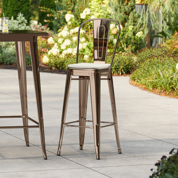 Lancaster Table & Seating Alloy Series Copper Outdoor Cafe Barstool with Tan Fabric Magnetic Cushion