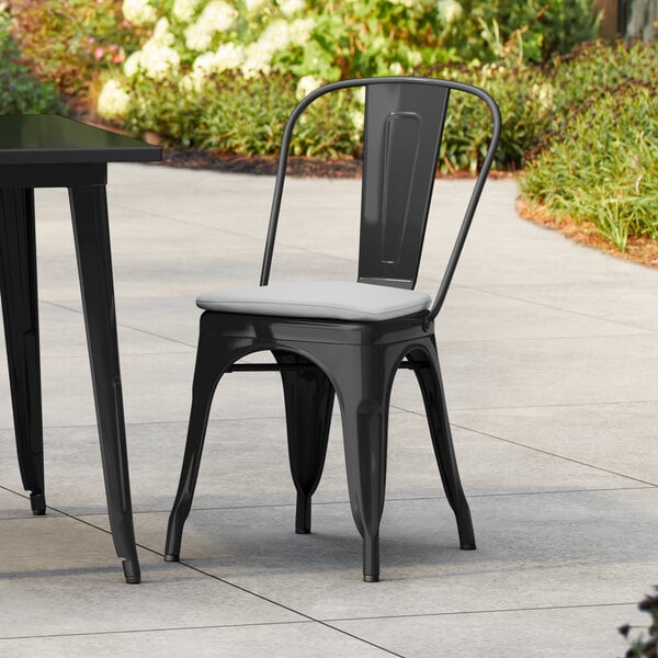 Lancaster Table & Seating Alloy Series Onyx Black Outdoor Cafe Chair with Gray Fabric Magnetic Cushion